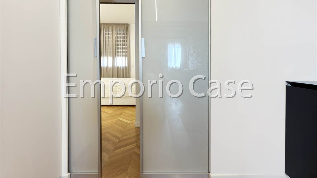PORTA IN VETRO SCORREVOLE